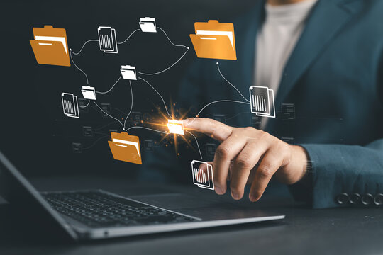 Auditor worker working with document folder ,Management of important document storage of organization ,ERP document system ,quality assessment management With a checklist ,online document database
