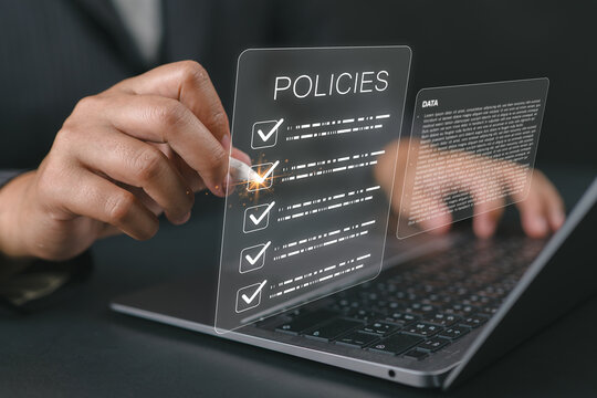 Businessman checking the steps through a virtual online document with a list of checkboxes Concepts of practices and policies, company articles of association Terms and Conditions.