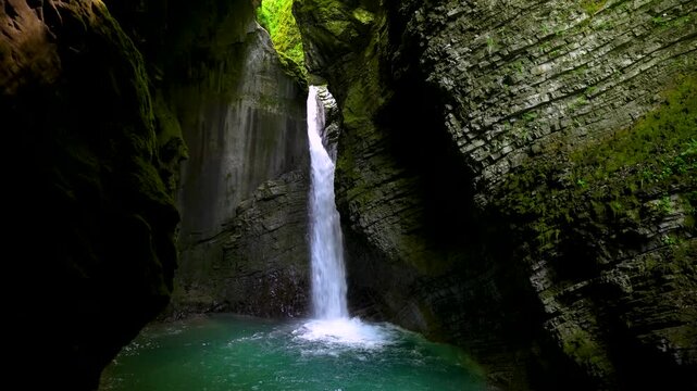Kozjak waterfall water cascade Slovenia Triglav National Park emerald green color