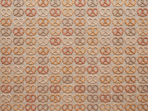 Seamless pretzel pattern background with textured baked dough snack design