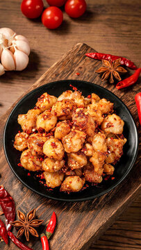 Spicy stir-fried chicken knee cartilage with chili and spices