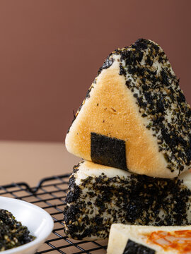 Onigiri shaped artisanal bread with seaweed and sesame seeds