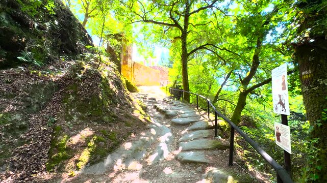 Stone path climbs through woodland to San Pedro de Rocas in Esgos, Ourense, Galicia, Spain