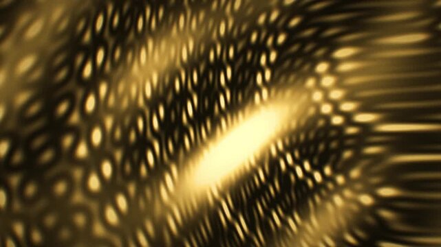 Grainy golden gradient abstract loop with soft glow and bokeh texture. Shimmering organic pattern creates a warm retro film look for seamless 3d loop animation.