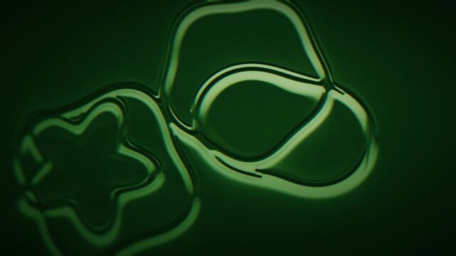 Grainy macro style glossy green liquid shapes with smooth reflections. Abstract seamless 3d loop animation with soft vignette and cinematic color grading.