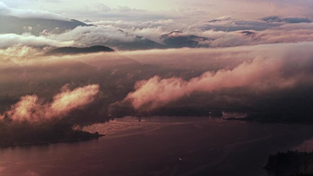 Lake Schroon Clarks Island WOL summer golden hour sunset mist low clouds aerial drone harbor view Up State New York landscape Town of Schroon Lake Pharaoh Mtn Adirondack Mountains circle left pan up