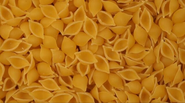 Rotation of abissini pasta as a texture close up	
