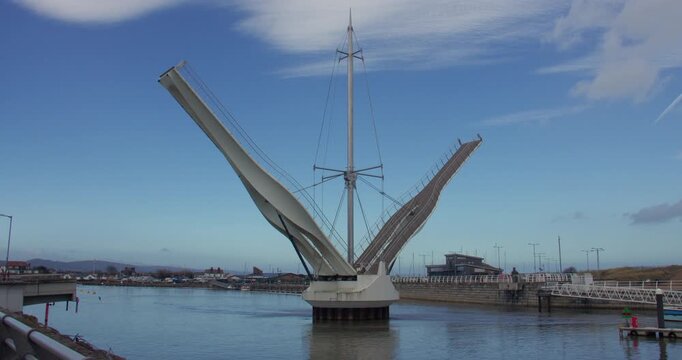 2x speed shot of Pont y Ddraig, Dragon's Bridge opening up at Rhyl harbour.