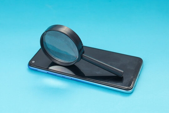 High Angle of Magnifying Glass on Smartphone Screen for Mobile Mockup