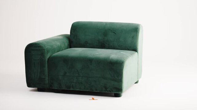 Dark Green Velvet Sofa Module with Single Armrest Photographed on a White Studio Sweep