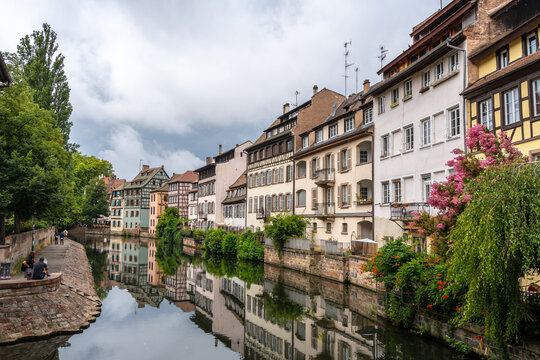 Canal with colorful houses and reflections in Strasbourg France