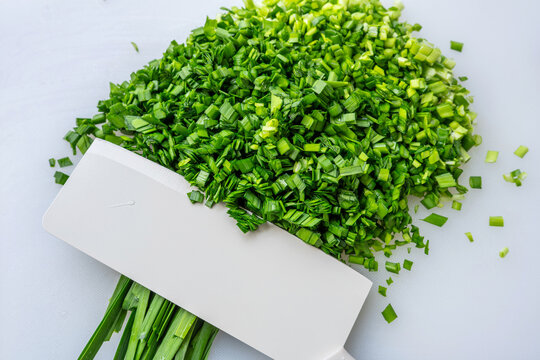 Chopped Chinese chives on the cutting board