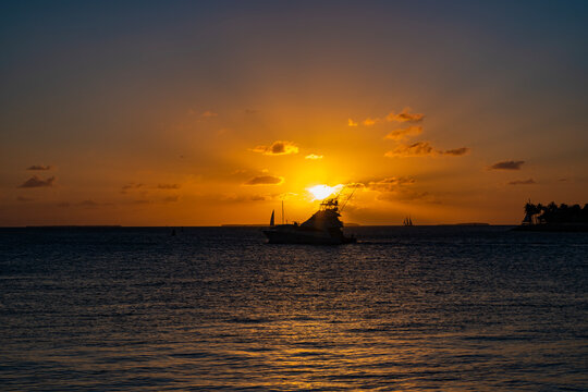 Sea sunset horizon. Sunset cloudy sky. Seascape at summer vacation. Skyscape with sea horizon. Horizon sunrise sea with ship. Sunrise seascape. Romantic summer vacation seascape