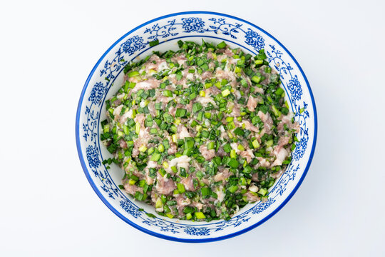 A bowl of chive and pork filling