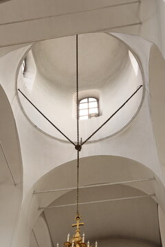 Historic chapel featuring tranquil architecture and soft natural lighting