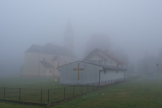 Church during foggy dull day
