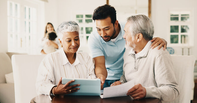 Man, talk and senior parents with tablet in home, financial planning or budget review with document. Happy, family and old people with son, help and bills with tech, online and discussion in house