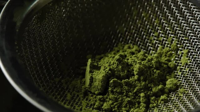 Barista preparing traditional matcha using setting. The scene highlights the careful preparation process, vibrant green matcha, and Japanese-inspired tea culture, making it suitable for beverage, caf&eacute;