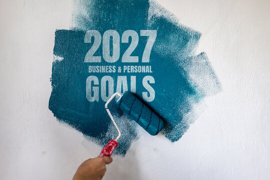2027 BUSINESS & PERSONAL GOALS Painted on a Teal Wall
