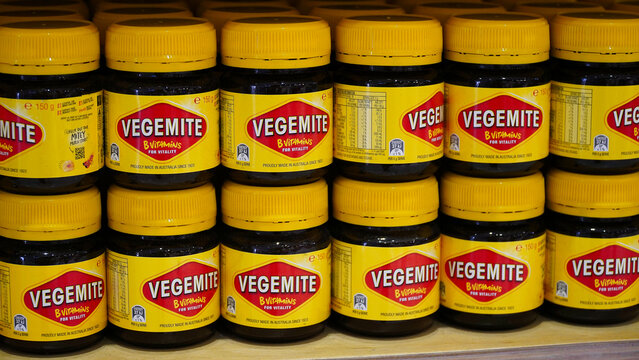 Vegemite shelf display showcasing popular Australian products in a vibrant retail setting