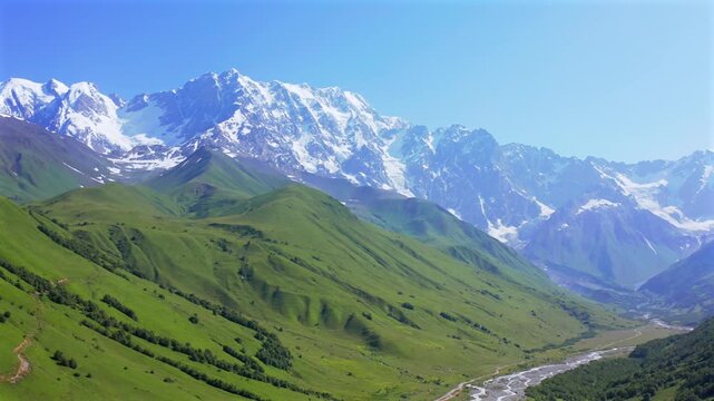 Drone circles Shkhara massif in aerial view above the Enguri valley, alpine slopes near Ushguli, supporting mountaineering tourism, glacier research, trekking promotion, Georgian mountain travel media
