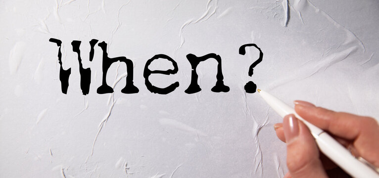 when? word on white paper
