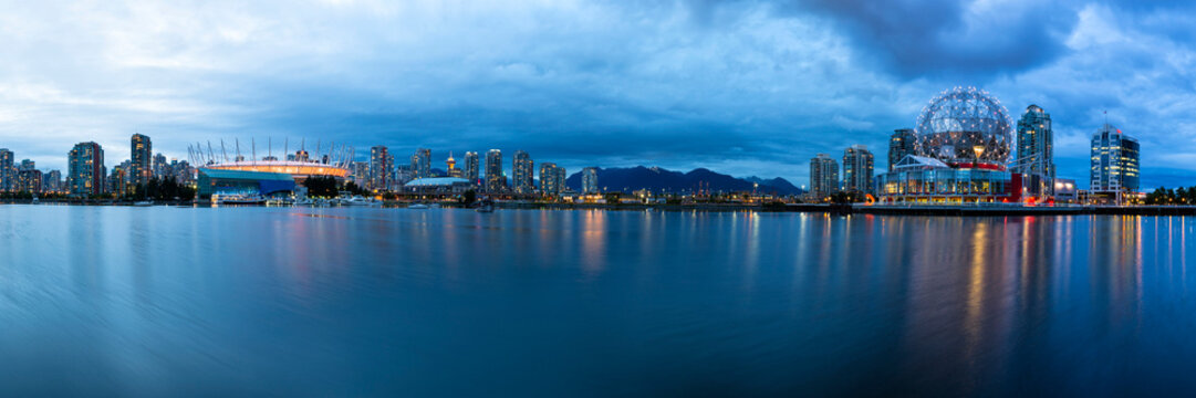 Canada, Skyline of Vancouver at night with BC Place Stadium and TELUS World of Science