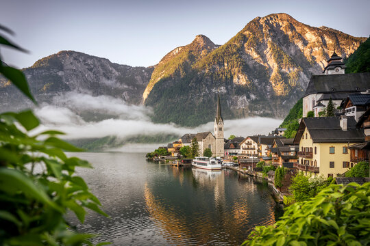 Fog covers the scenic village of Hallstatt in Austria