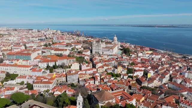 Slow panoramic drone shot of National Pantheon, Lisbon at midday. Bright sunny day, clear blue sky. Historic Baroque architecture. Portugal