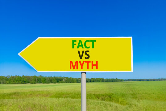 Fact vs versus myth words symbol. Concept words Fact vs Myth on beautiful yellow road sign. Beautiful blue sky green grass background. Business and fact vs versus myth concept. Copy space.