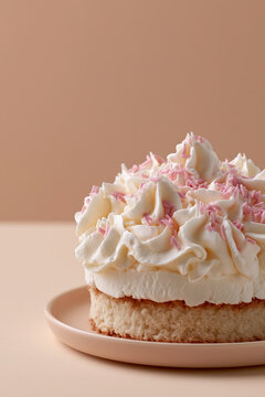 Slice of Vanilla Sponge Cake with Whipped Cream and Pink Sprinkles on Pink Background, Minimalist Close Up Dessert Banner with Copy Space