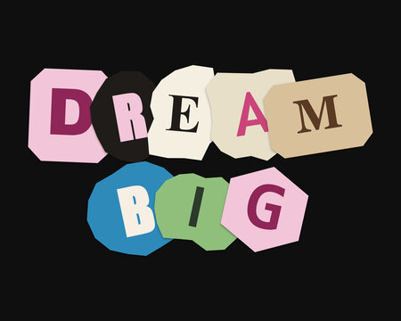Dream big text made with colorful cut out paper letters on a black background