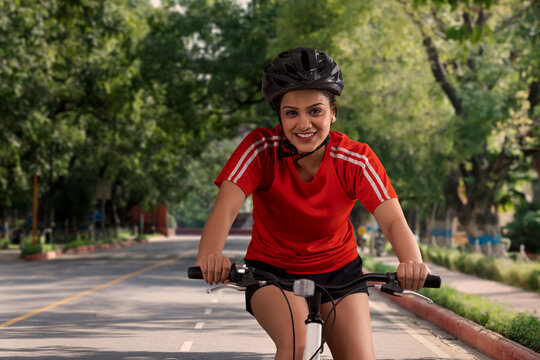 A PROFESSIONAL CYCLIST HAPPILY CYCLING