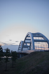 Double-arch Zezelj bridge stands over Danube river bank in Novi Sad, Serbia © Denis Renkas
