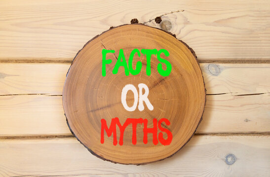 Facts or myths words symbol. Concept words Myths or Facts on beautiful wooden circle. Beautiful wooden wall background. Business and facts or myths concept. Copy space.