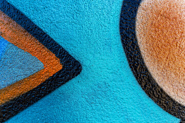 Art under ground. Beautiful street art graffiti background. The wall is decorated with abstract drawings house paint. Modern style urban culture of street youth. Abstract picture on wall © Yaroslav