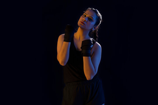 A STYLISH YOUNG WRESTLER POSING IN FRONT OF CAMERA