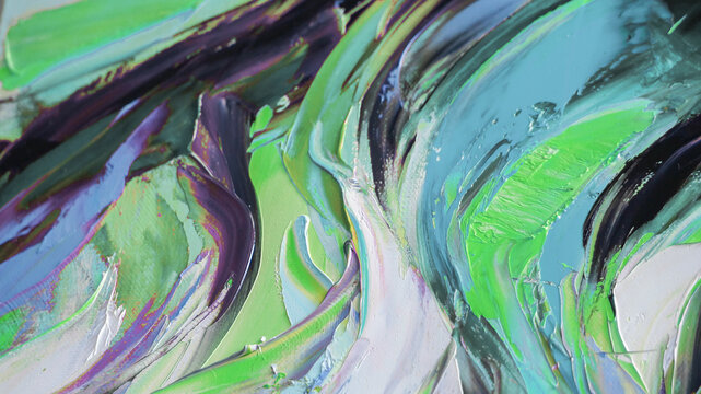 Closeup of a painting by oil and palette knife. Highly-textured, high quality details. Fragment of multicolored texture painting. Abstract art background. oil on canvas. Rough brushstrokes of paint.