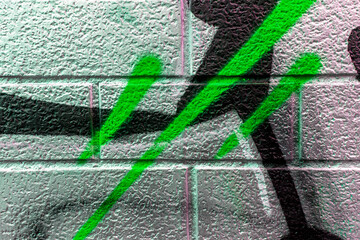 vivid street graffiti texture of colotful spray painting strips on gray metallic brick background, urban culture of modern youth backdrop © Yaroslav