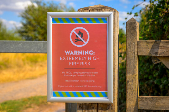 Warning Extremely High Fire Risk Sign At Rural Gate Prohibiting Barbecues And Open Fires
