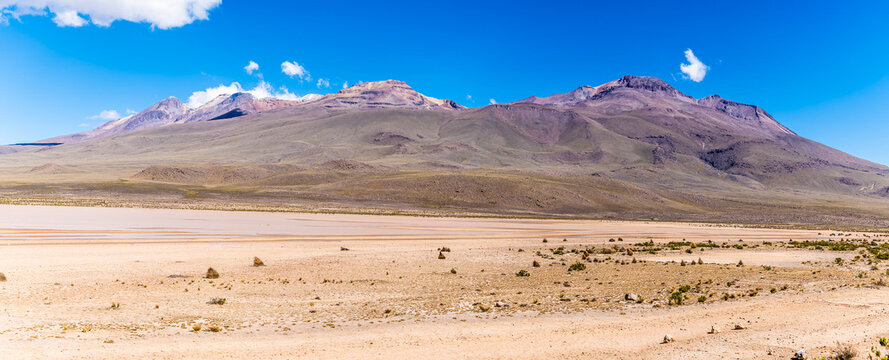 A view showing the high altitude arid landscape along the route from Arequipa toward the Colca Canyon in the Andes mountains of southern Peru in the dry season