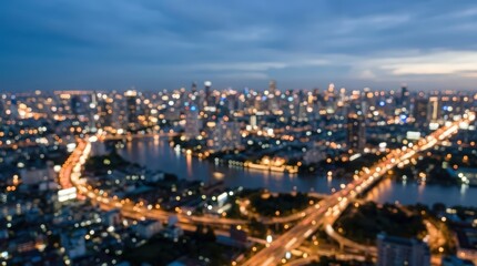 Naklejka premium City skyline at night features blurred lights from skyscrapers and traffic flowing over a bridge. The urban landscape glows with soft bokeh effects under a twilight sky.