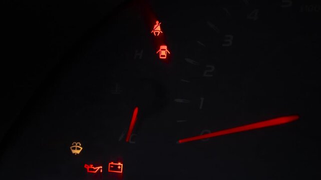 car dashboard speedometer at night