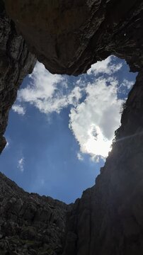 Stunning Vertical Camera Roll Pointing Up at the Sky from a Deep Snow Pit in the Remote Alpine Wilderness