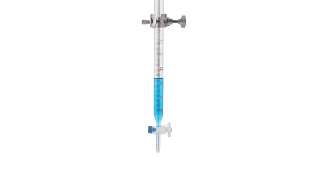 Laboratory burette filled with blue liquid and clamp