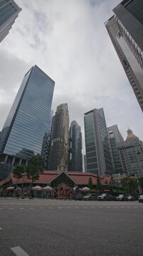 Contemporary skyscrapers in Singapore city business district showcasing financial offices modern architecture vibrant downtown skyline and urban development across Asia 