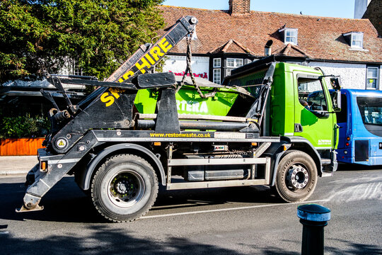 Close-Up Of A Reston Waste Skip Hire Lorry Driving On A Town Centre Main Road