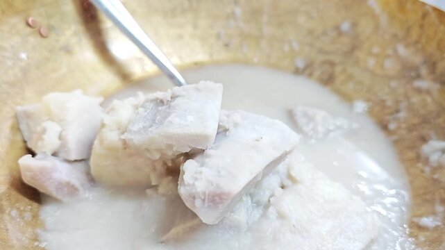 Traditional Thai dessert sweet taro in coconut milk Pheuak Buat Chi.
