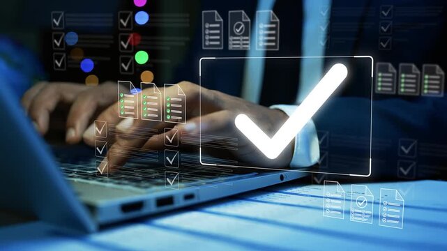 Businessman using laptop with hologram check mark and digital checklist icons, showing approval, audit, compliance, and successful online document review, Holographic digital checklist approval