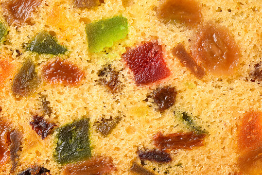 Top view close up texture of traditional Christmas fruitcake with dried fruits